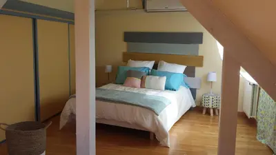 Un ou plusieurs lits dans un hébergement de l'établissement Appartement De La Vallée