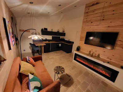 Télévision ou salle de divertissement dans l'établissement Cabanes en Loire, Gite & SPA en pleine nature