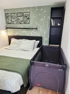 Un ou plusieurs lits dans un hébergement de l'établissement Gîte Studio 4 à 6 personnes