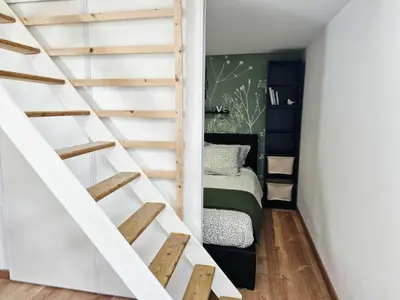 Un ou plusieurs lits dans un hébergement de l'établissement Gîte Studio 4 à 6 personnes