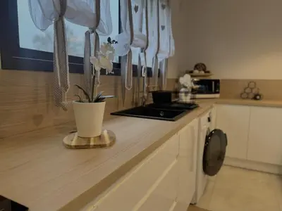 Cuisine ou kitchenette dans l'établissement Dépendance de charme