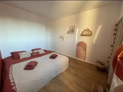 Un ou plusieurs lits dans un hébergement de l'établissement Appartement de la Famille Chat
