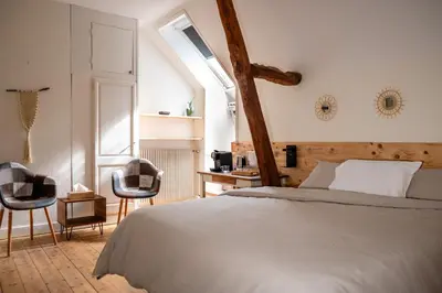 Un ou plusieurs lits dans un hébergement de l'établissement B&B BienViennue