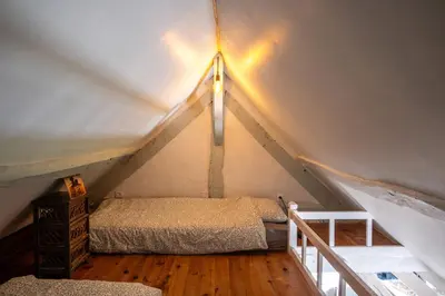 Un ou plusieurs lits dans un hébergement de l'établissement B&B BienViennue
