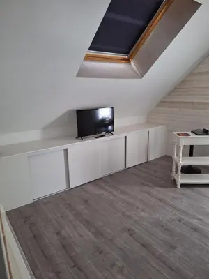 Télévision ou salle de divertissement dans l'établissement Chambres Teloché