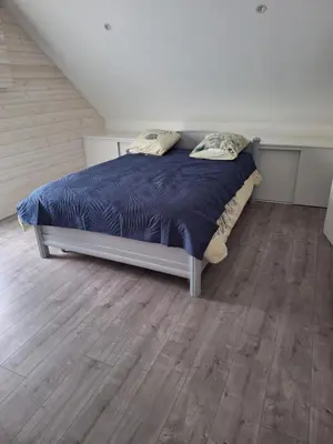 Un ou plusieurs lits dans un hébergement de l'établissement Chambres Teloché