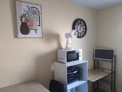 Télévision ou salle de divertissement dans l'établissement Studette COSY 2 couchages proche TOURS