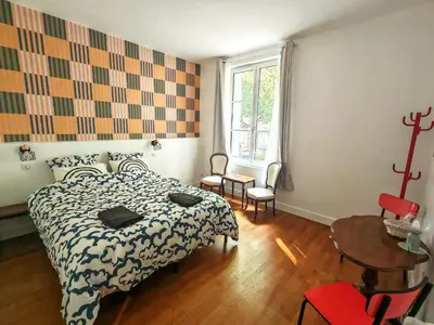 Un ou plusieurs lits dans un hébergement de l'établissement 2 chambres - entrée privée - gare & palais de congés à 5 min - self check-in
