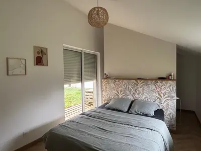 Un ou plusieurs lits dans un hébergement de l'établissement MAISON CENTRE D'ARNAGE idéal 24h du Mans et Le Mans classic