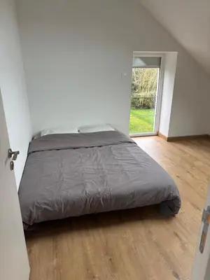 Un ou plusieurs lits dans un hébergement de l'établissement MAISON CENTRE D'ARNAGE idéal 24h du Mans et Le Mans classic