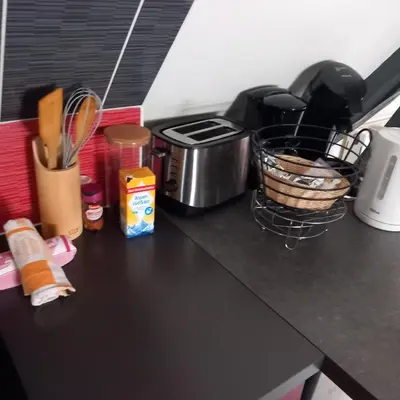 Cuisine ou kitchenette dans l'établissement Le Cocon Appartement chaleureux hypercentre Blois