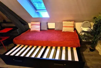 Un ou plusieurs lits dans un hébergement de l'établissement Le Cocon Appartement chaleureux hypercentre Blois