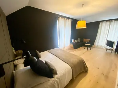 Un ou plusieurs lits dans un hébergement de l'établissement 2 Chambres, spéciales 24H DU MANS