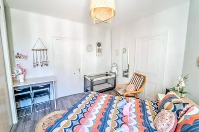 Un ou plusieurs lits dans un hébergement de l'établissement Sweet Appartement élégante hypercentre Blois