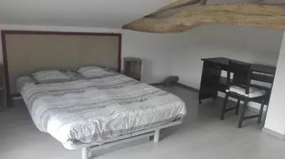Un ou plusieurs lits dans un hébergement de l'établissement Maison rénovée dans un corps de ferme