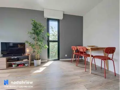 Télévision ou salle de divertissement dans l'établissement Appartement au bord du lac
