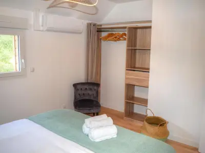 Un ou plusieurs lits dans un hébergement de l'établissement Gîte de charme en Touraine avec spa et jardin privé - FR-1-381-610