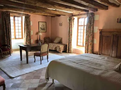 Un ou plusieurs lits dans un hébergement de l'établissement Renaissance manor La Vieille Brèche