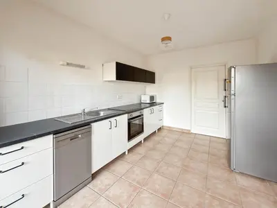Cuisine ou kitchenette dans l'établissement Le refuge