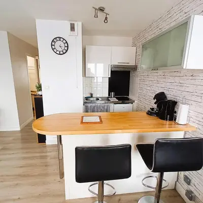 Cuisine ou kitchenette dans l'établissement Chez Auguste - T2 spacieux - wifi - tv