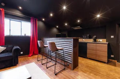 Cuisine ou kitchenette dans l'établissement Loft 8 Chic et Cosy - WIFI - Arnage