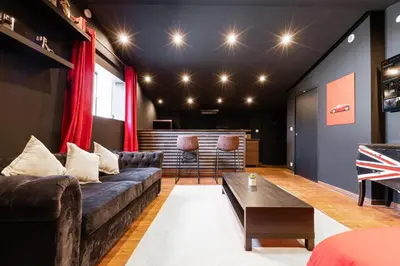 Coin salon dans l'établissement Loft 8 Chic et Cosy - WIFI - Arnage
