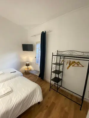 Un ou plusieurs lits dans un hébergement de l'établissement Logement Spacieux 3 Chambres à Azay-le-Rideau
