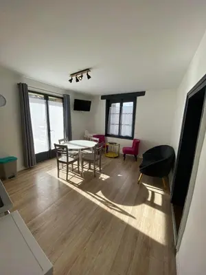 Coin salon dans l'établissement Appt 5 personnes - 2 Chambres, terrasse et jardin