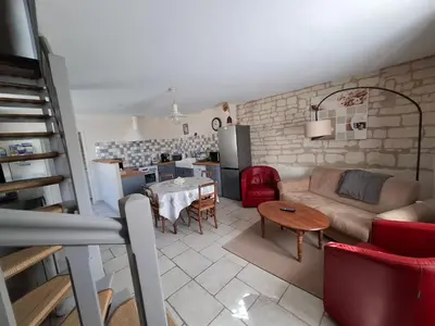Coin salon dans l'établissement Gite Les Laurielles