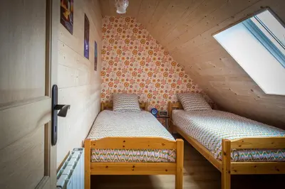 Un ou plusieurs lits dans un hébergement de l'établissement So Vintage - Gite seventies en Anjou