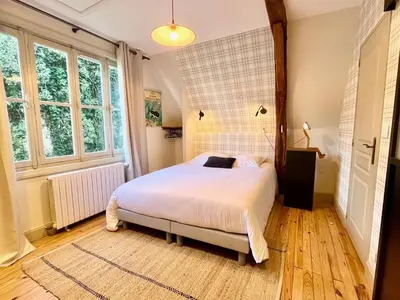Un ou plusieurs lits dans un hébergement de l'établissement Studio Dépendance du Château - Kitchenette