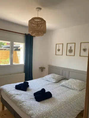 Un ou plusieurs lits dans un hébergement de l'établissement gîte avec sauna