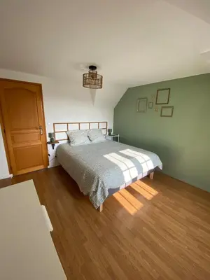 Un ou plusieurs lits dans un hébergement de l'établissement gîte avec sauna