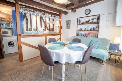 Cuisine ou kitchenette dans l'établissement La Petite Hermine