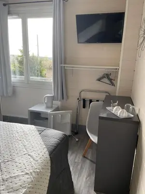 Coin salon dans l'établissement Les Chambres de la Gare