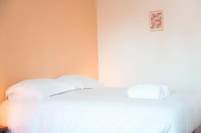 Un ou plusieurs lits dans un hébergement de l'établissement L'Unique- Maison de famille en Plein Centre-Ville