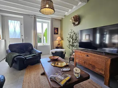 Télévision ou salle de divertissement dans l'établissement La Maison du Vigneron