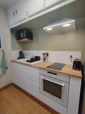Cuisine ou kitchenette dans l'établissement Gîte Belle vue au Gros Caillou, 13mn du Zoo de Beauval