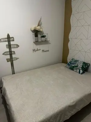 Un ou plusieurs lits dans un hébergement de l'établissement Maison Georget