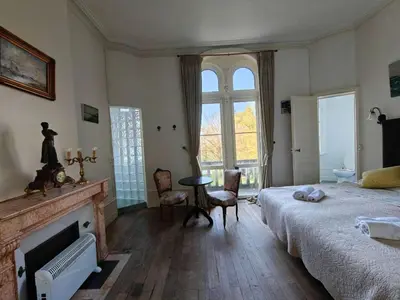 Un ou plusieurs lits dans un hébergement de l'établissement Château de Vallagon