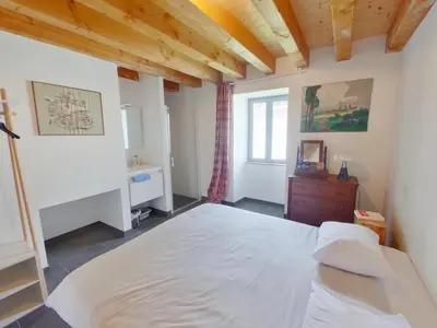 Un ou plusieurs lits dans un hébergement de l'établissement Maison de vacances à Sossais - Campagne calme, 3 chambres, proche sites touristiques - FR-1-541-172