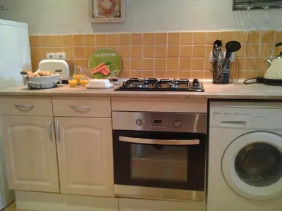 Cuisine ou kitchenette dans l'établissement Jasmine cottage