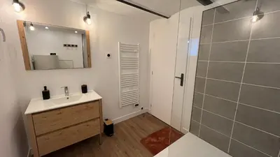 Salle de bains dans l'établissement Le Garage