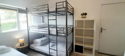 Un ou plusieurs lits dans un hébergement de l'établissement Gîte familial à Azay le Rideau avec Parking