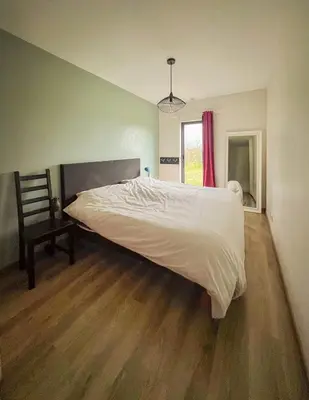 Un ou plusieurs lits dans un hébergement de l'établissement Maison d'architecte à Semblançay