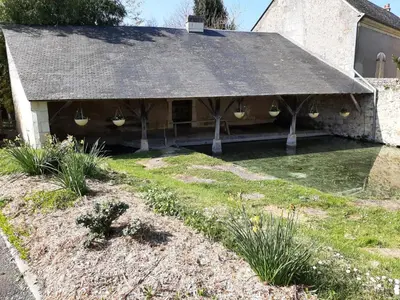 Jardin de l'établissement Au pied du Lavoir chambre Germaine