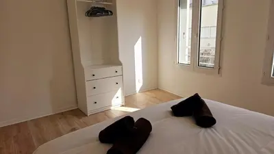 Un ou plusieurs lits dans un hébergement de l'établissement Paul Eluard - Maison au calme parking centre Tours