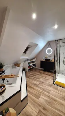 Coin salon dans l'établissement Chambre près du circuit des 24h