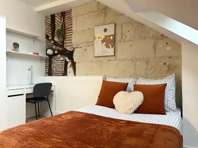 Un ou plusieurs lits dans un hébergement de l'établissement Terracotta - Quai de la Loire - Cozy