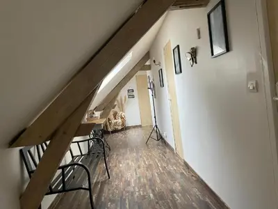 Coin salon dans l'établissement Chambre double avec teléviseur